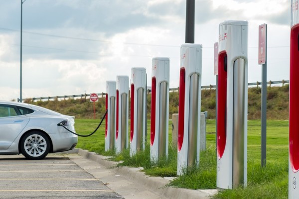 A car loads up on electricity, generating...value